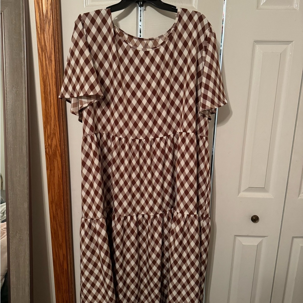 knee length crème and brown dress